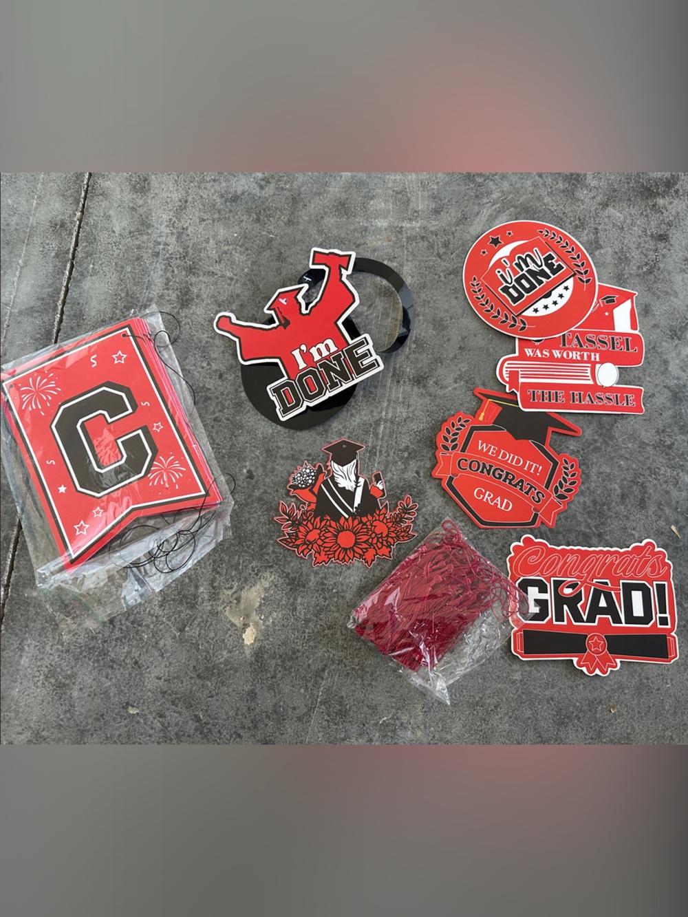Red and Black Graduation Banner and some Party Decorations,